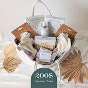 Boîte cadeau naissance jumeaux 200$ dans panier en coton avec soins bébé et accessoires assortis produits locaux